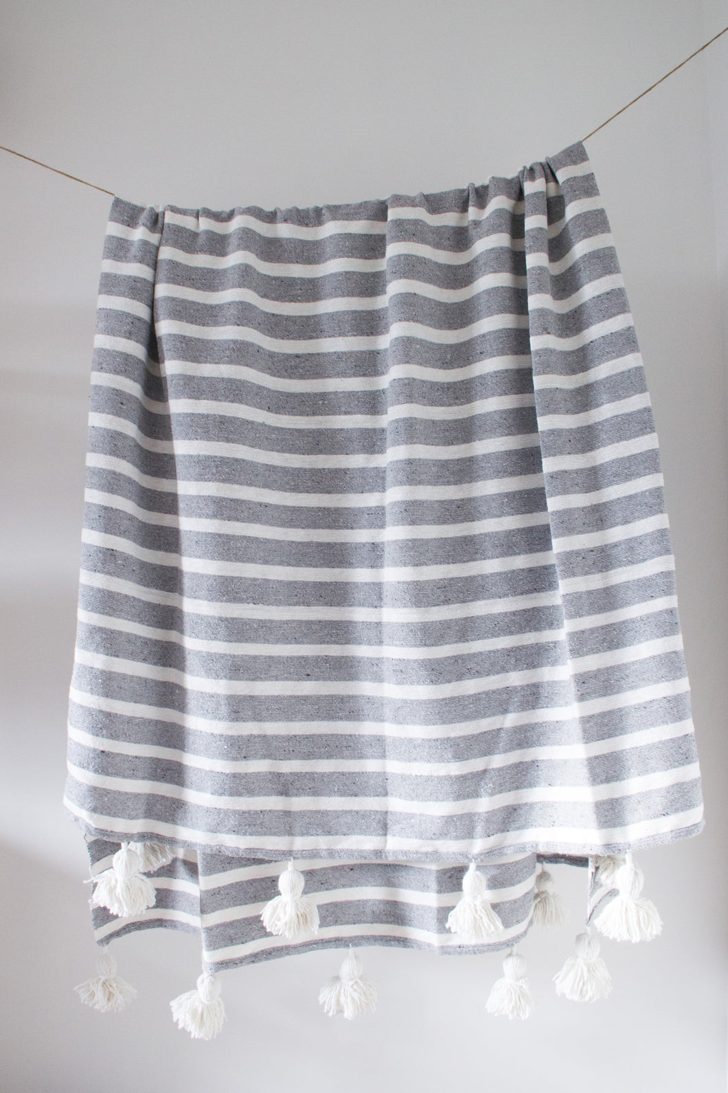 Grey Wide Stripe Pom Pom Blanket